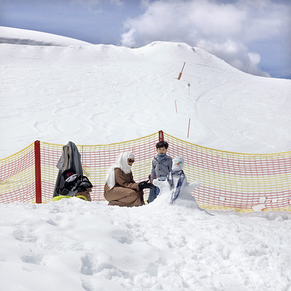 a-mother-and-son-enjoying-the-snow-on-the-kirzsteinhorn-glacier-and-making-a-snowman.jpg