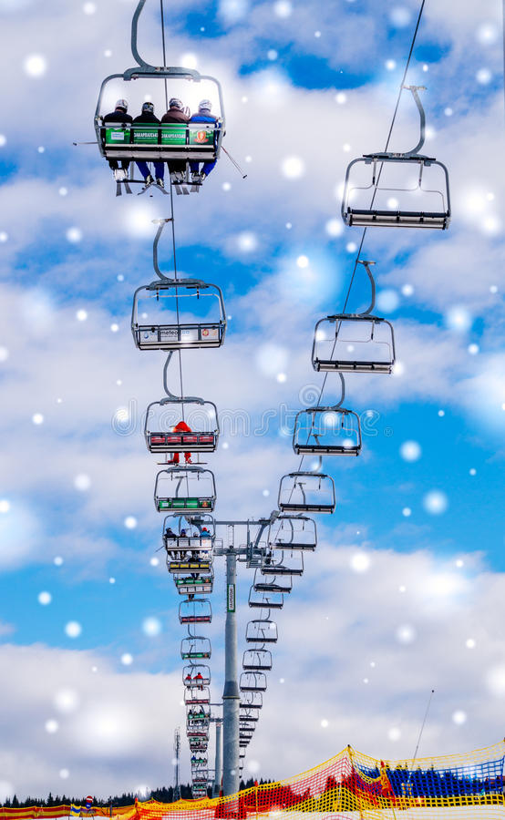 odern-ski-lift-background-blue-sky-ski-resort-bukovel-ukraine-polyanytsya-village-ivano-88678795.jpg