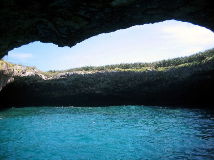 ce-of-the-lush-green-island-exposes-a-secret-beach-with-ample-shade-sun-and-crystal-clear-water..jpg