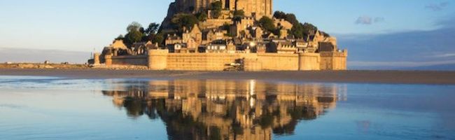 -island-of-Mont-Saint-Michel-located-off-France%E2%80%99s-northwestern-coast-in-Normandy-810x198.jpg