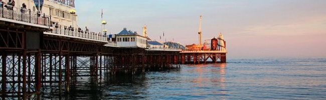 the-Palace-Pier-juts-out-to-sea-like-the-upper-deck-of-a-steamer-on-spindly-iron-legs.-630x198.jpg