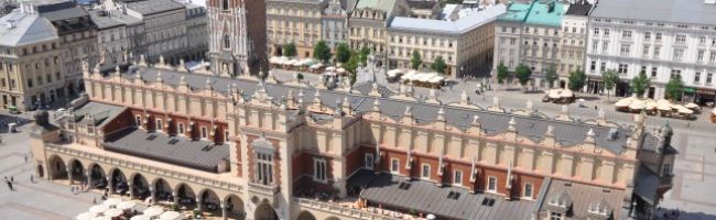 Sukiennice_and_Main_Market_Square_Krakow_Poland-940x198.jpg