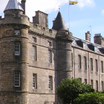 The-Royal-Standard-as-used-in-Scotland-flying-over-Holyrood-Palace.-150x150.png