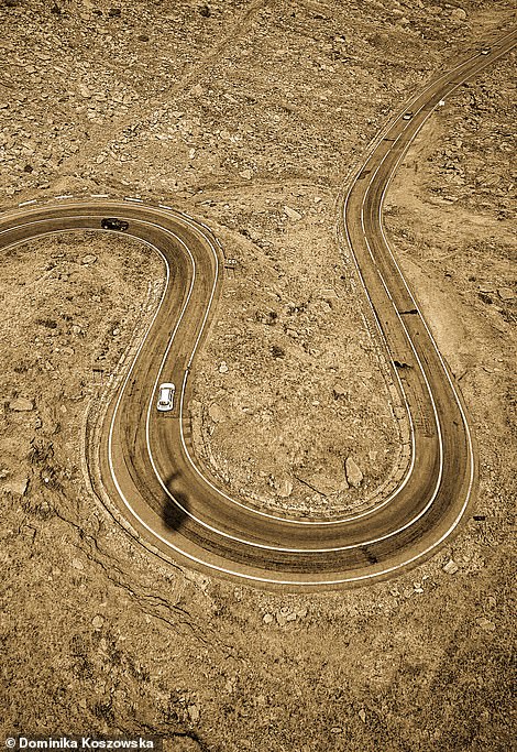 n_aerial_shot_of_a_winding_road-a-65_1550247273105.jpg