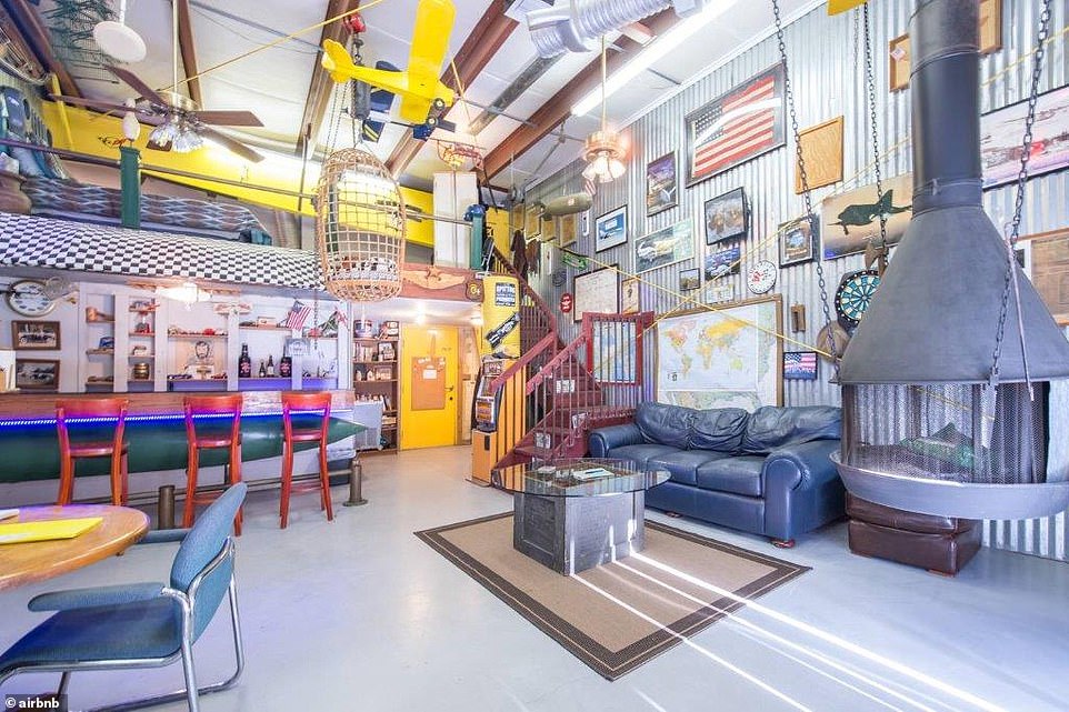 A-man-cave-in-an-active-plane-hangar-in-Florida.jpg