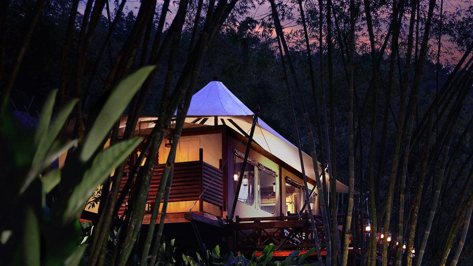 003496-01-tent-exterior-jungle-sunset.jpg