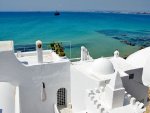 sias-top-resort-a-dreamy-place-dotted-with-pristine-white-buildings-set-beside-a-bright-blue-sea.jpg