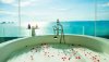 ntal-samui-club-panoramic-ocean-view-suite-bathtub.jpg