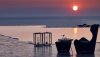 66-14-Santo-Maris-Oia_Main-Swimming-Pool_Sunset_03.jpg